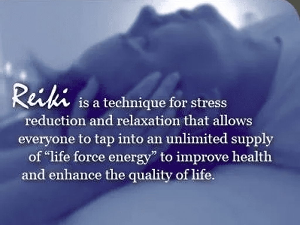 A person laying down with their hands on the chest.