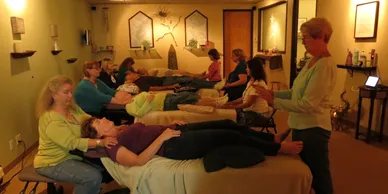 rs=w_388,h_194,cg_true (3) A group of people laying on the floor in a room.